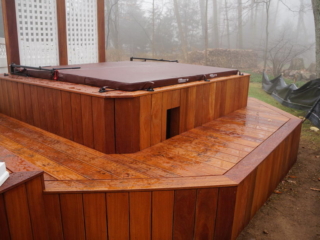 AFTER - STAMFORD CT  MULTI LEVEL DECK WITH HOT TUB. TROPICAL HARDWOOD CUMARU DECKING AND RAILING. YOUR LOCAL CONTRACTOR AND BUILDER