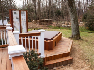 AFTER - STAMFORD CT  MULTI LEVEL DECK WITH HOT TUB. TROPICAL HARDWOOD CUMARU DECKING AND RAILING. YOUR LOCAL CONTRACTOR AND BUILDER