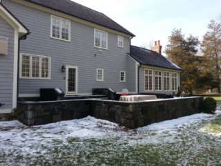 BEFORE - GREENWICH CT Roof over patio with a huge custom skylight Build in outdoor kitchen grill and fireplace. Best Builder and contractor