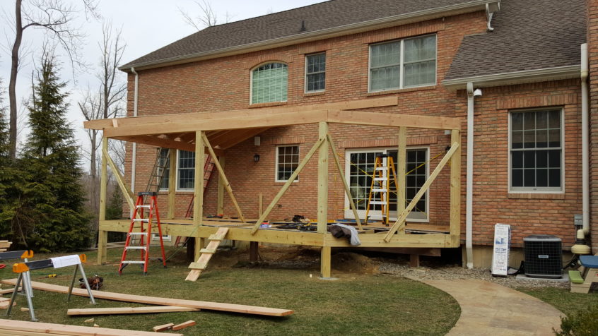 Construction phase - Katonah NY converting deck into a screened-in porch. Architect Design and Builder