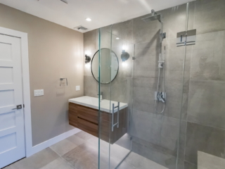 New Relocated Contemporary Bath(Frameless Glass Enclosure, Bench, Curbless Shower Entry, Floating Modern Vanity )