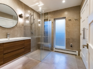 New Relocated Contemporary Bath(Frameless Glass Enclosure, Bench, Curbless Shower Entry, Floating Modern Vanity )