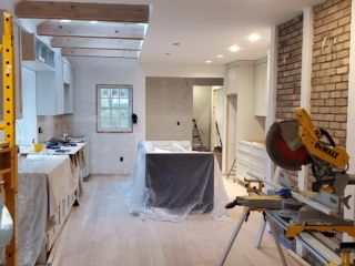 construction in progress. walls removed and open the ceiling for adding skylight